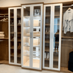 Full look of the glass enclosed cabinet and shoe shelves!