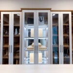 This His and Hers small closet has interior lighting to help you browse your clothes easier!