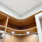 Closer look of the rounded corner shelves, and uninterrupted hanging rods!