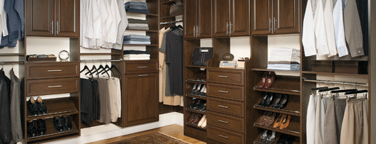 luxury walk in closet with wood cabinet and shelves