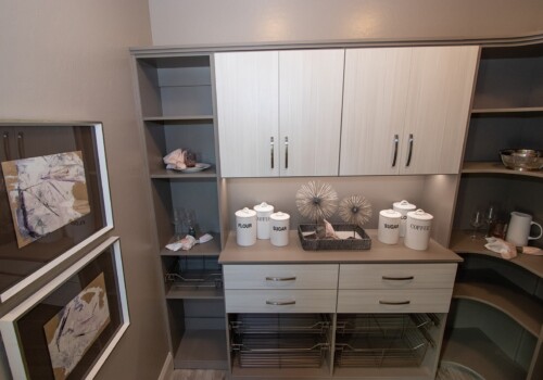 Taking the color scheme of the home into consideration is only the first step in building a luxury custom pantry. Closets Las Vegas evaluated what functional aspects would make this pantry easier to use, while still looking elegant. With that in mind, they brought elevated functionality and beauty to the design of this custom pantry shelving system. See how we tie in functionality and beauty in this luxury, custom pantry shelving system complete with a tabletop, removable baskets, and more!