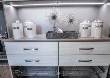 Las Vegas custom kitchen pantry drawers and steel baskets with decorative condiment containers on top Drawers and steel baskets custom pantry shelving systems Las Vegas