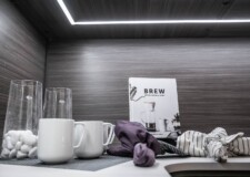 An elegant looking custom built pantry countertop with cups and some accessories Cups and accessories on custom built pantry countertop in Las Vegas