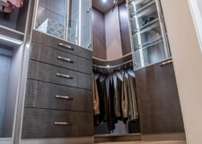 This expensive walk in closet for him has an elegant modern design from floor to wall to ceiling. Elegant design and expensive walk in closets in Las Vegas made for him