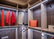 Each shelf of this high end custom closets for her in Las Vegas has its own lighting that is remote-control operated. Smart lighting system for a high end custom closets for her in Las Vegas