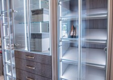 Luxury shoe rack and cabinets with slightly tinted aluminum-framed glass doors and crocodile pattern drawer fronts crocodile pattern drawer fronts and slightly tinted aluminum-framed glass doors
