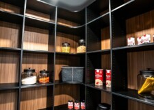 In this custom kitchen pantry design, the light brown-colored walls are massive enough to accommodate a number of shelves. Design Kitchen Pantry Las Vegas, NV