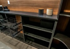 The lower portion of this custom kitchen pantry design has three layer dark brown shelves and detachable steel baskets that can be used as service tray. Design Kitchen Pantry Las Vegas, NV