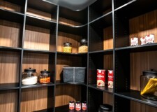 This two-toned custom kitchen pantry design definitely stands out with its combination of dark and light brown wood. Kitchen Pantry Organizer Systems Las Vegas, NV
