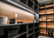 A perfect combination of dark brown shelving system and light brown-colored backwalls truly stand out in this custom kitchen pantry. Kitchen Pantry Closet Organizer Las Vegas, NV
