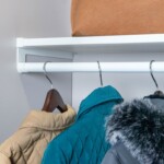 VUE product featuring a white rod and white shelf