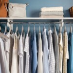 L corner with chrome rods and white shelves