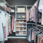 View of the closet with double and single hang and a shoe stack