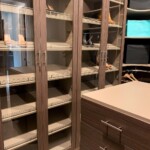 The elegant color of Driftwood Live was used on the closet door frames, and drawer fronts for a rich and balanced design. Closet Design Companies Las Vegas, NV