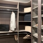 This closet features double hang shelves.