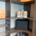 With the rounded corner shelves, you can utilize every space in this custom pantry.