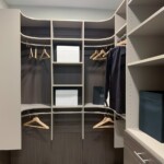 Closer look to the top and bottom double hang shelves and top shelves.