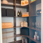 Top to bottom view of the custom pantry design.