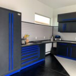 While this custom garage cabinets have blue accents, Closets Las Vegas also offers other colors for your cabinet handles!