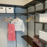 This small bedroom closet has double hang shelves you can use for your clothes. Shelving For Small Closets