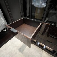 In this custom walk in closet, all doors, drawers, interior, and exterior match colors and material. See this opened drawer as an example!