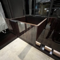 In this custom walk in closet, all doors, drawers, interior, and exterior match colors and material. See this opened drawer as an example!