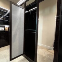 How it looks like when you open the the mirrored doors of this custom walk in closet.