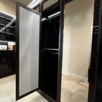 How it looks like when you open the the mirrored doors of this custom walk in closet.
