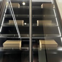 Closer look of the slanted shoe shelves with lighting.