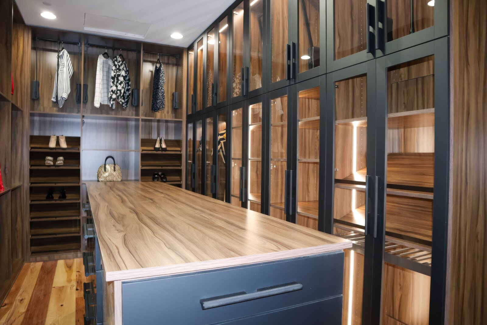 Dark walnut custom closet with center island